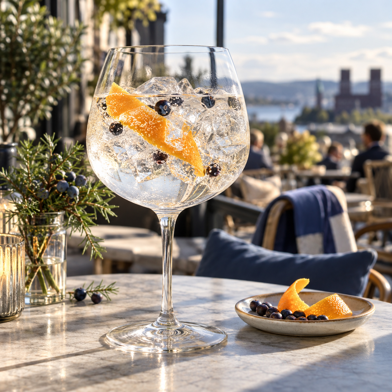 Vålerenga Gin served with Schweppes Dry Tonic, garnished with Lemon Peel and Bilberry