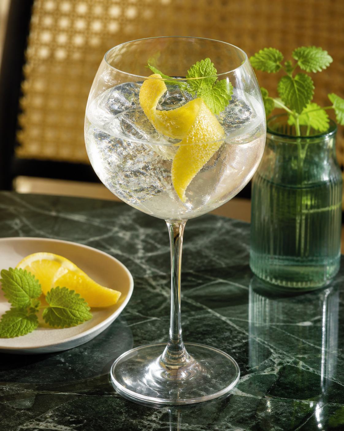 2 Brothers Premium Gin Citrus served with Fever-Tree Indian Tonic Water, garnished with Lemon balm and Lemon twist